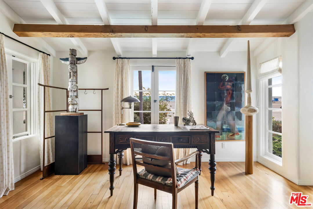 1020 Palisades Beach Road Santa Monica, CA 90403 - Photo 13 of 41 a view of a dining room with furniture window and wooden floor