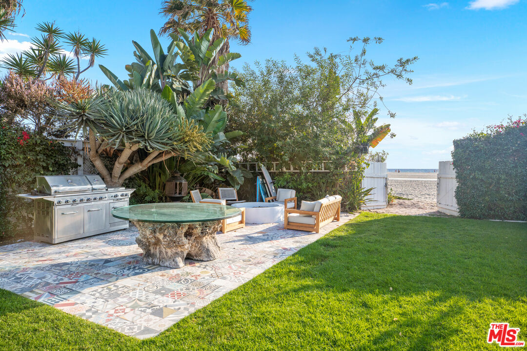 1020 Palisades Beach Road Santa Monica, CA 90403 - Photo 30 of 41 a view of a backyard with sitting area