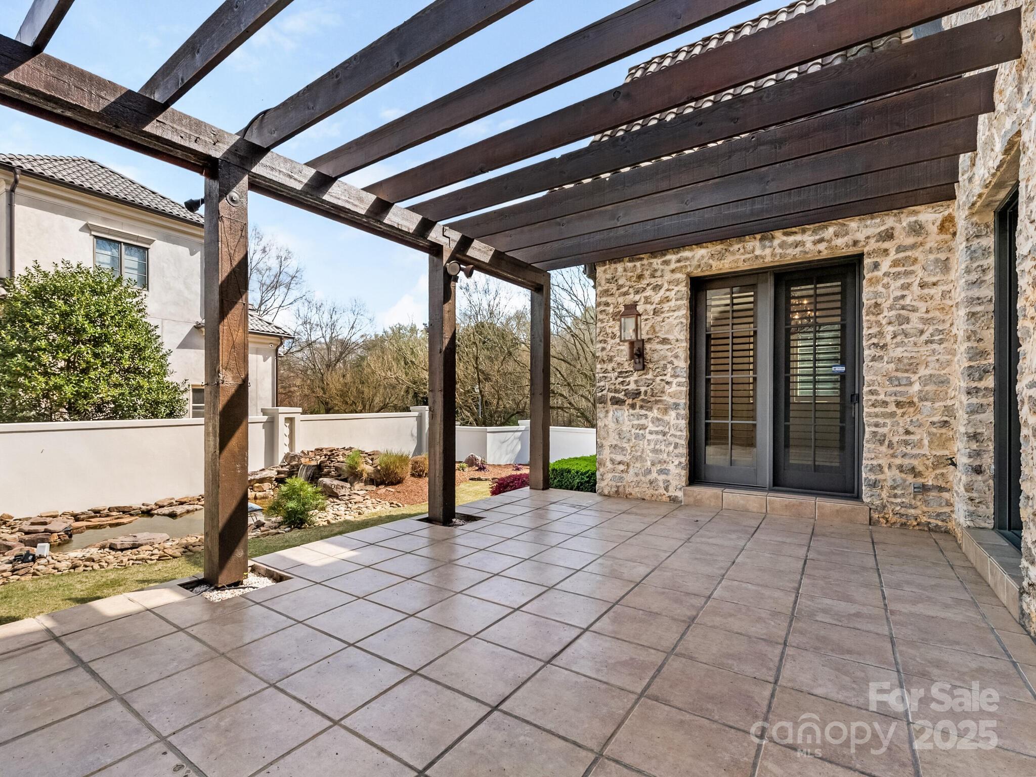 8525 Double Eagle Gate Way, Unit 2 Charlotte, NC 28210 - Photo 17 of 48 a view of a porch