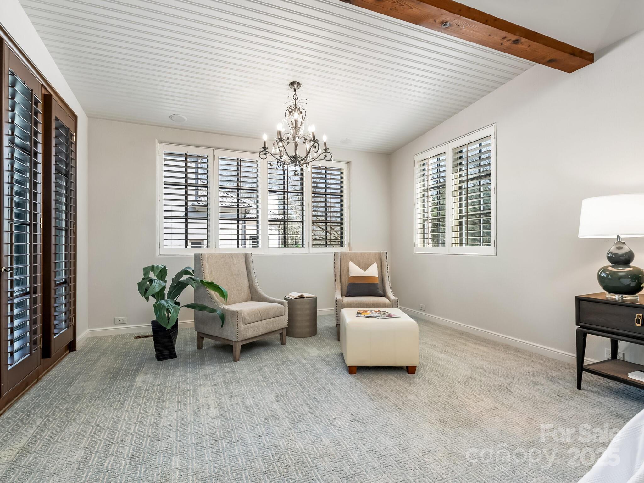 8525 Double Eagle Gate Way, Unit 2 Charlotte, NC 28210 - Photo 20 of 48 a living room with furniture and windows