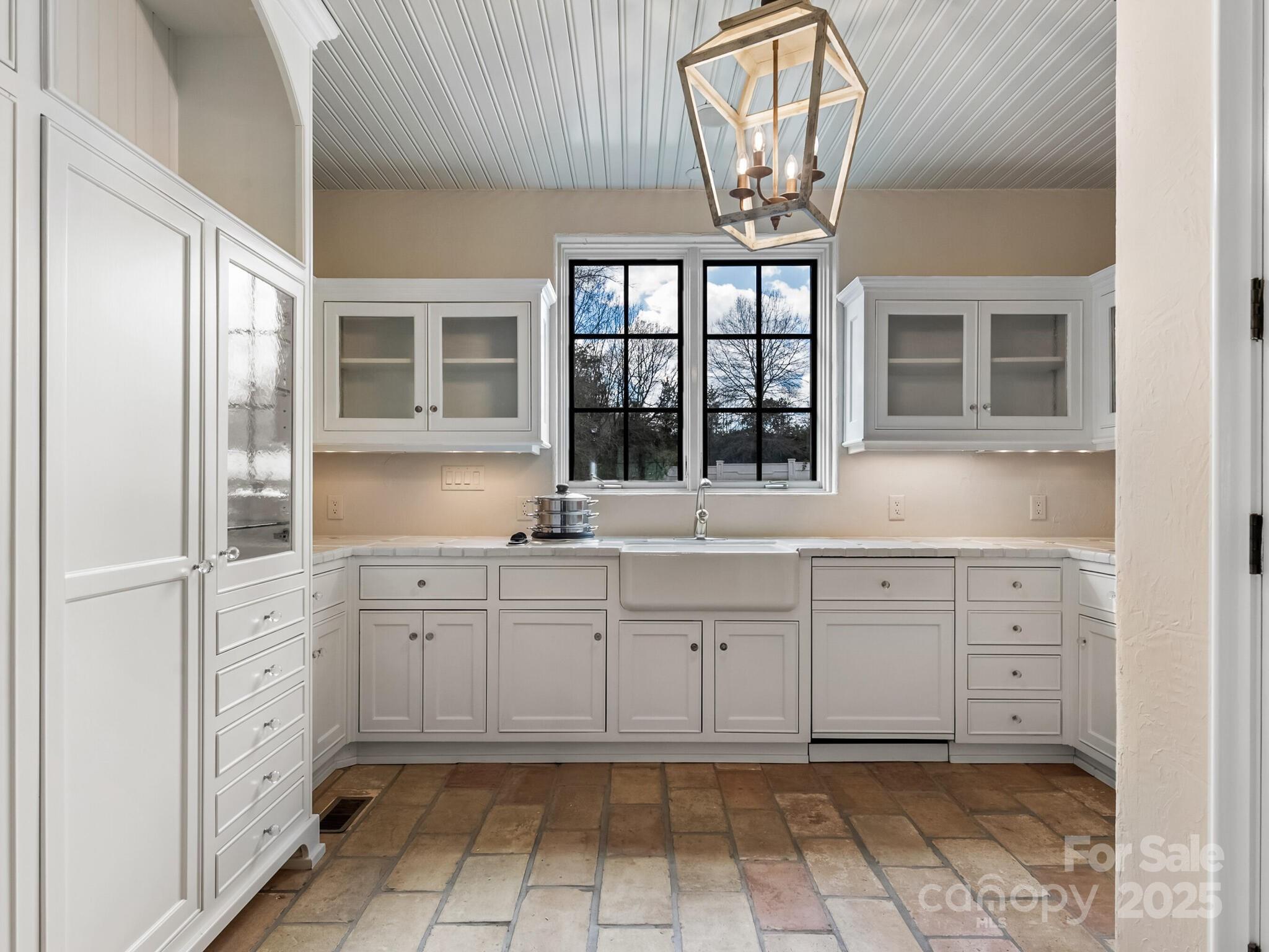 8525 Double Eagle Gate Way, Unit 2 Charlotte, NC 28210 - Photo 4 of 48 a kitchen with a sink and a window