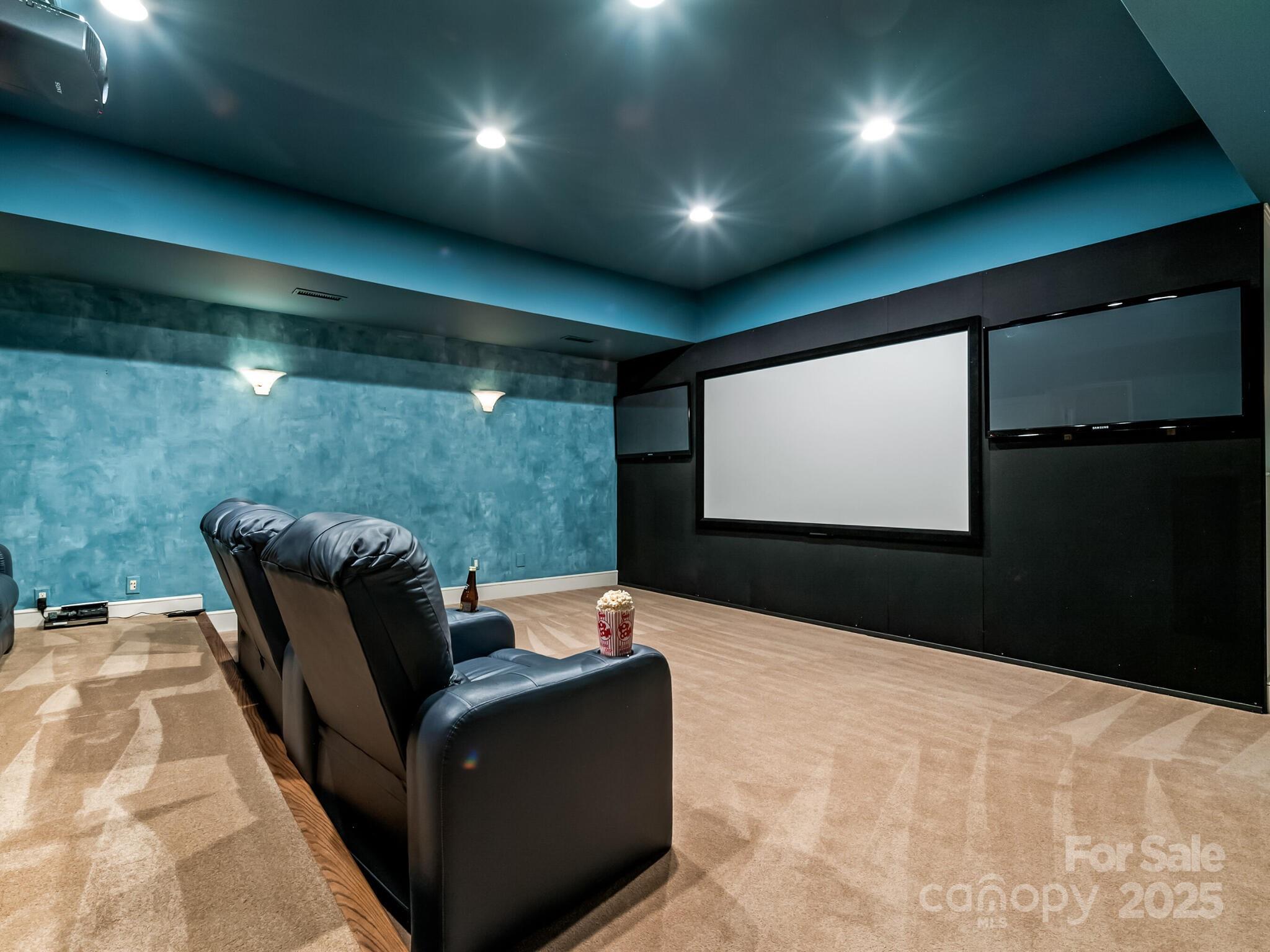 8525 Double Eagle Gate Way, Unit 2 Charlotte, NC 28210 - Photo 45 of 48 a projector room with seating space