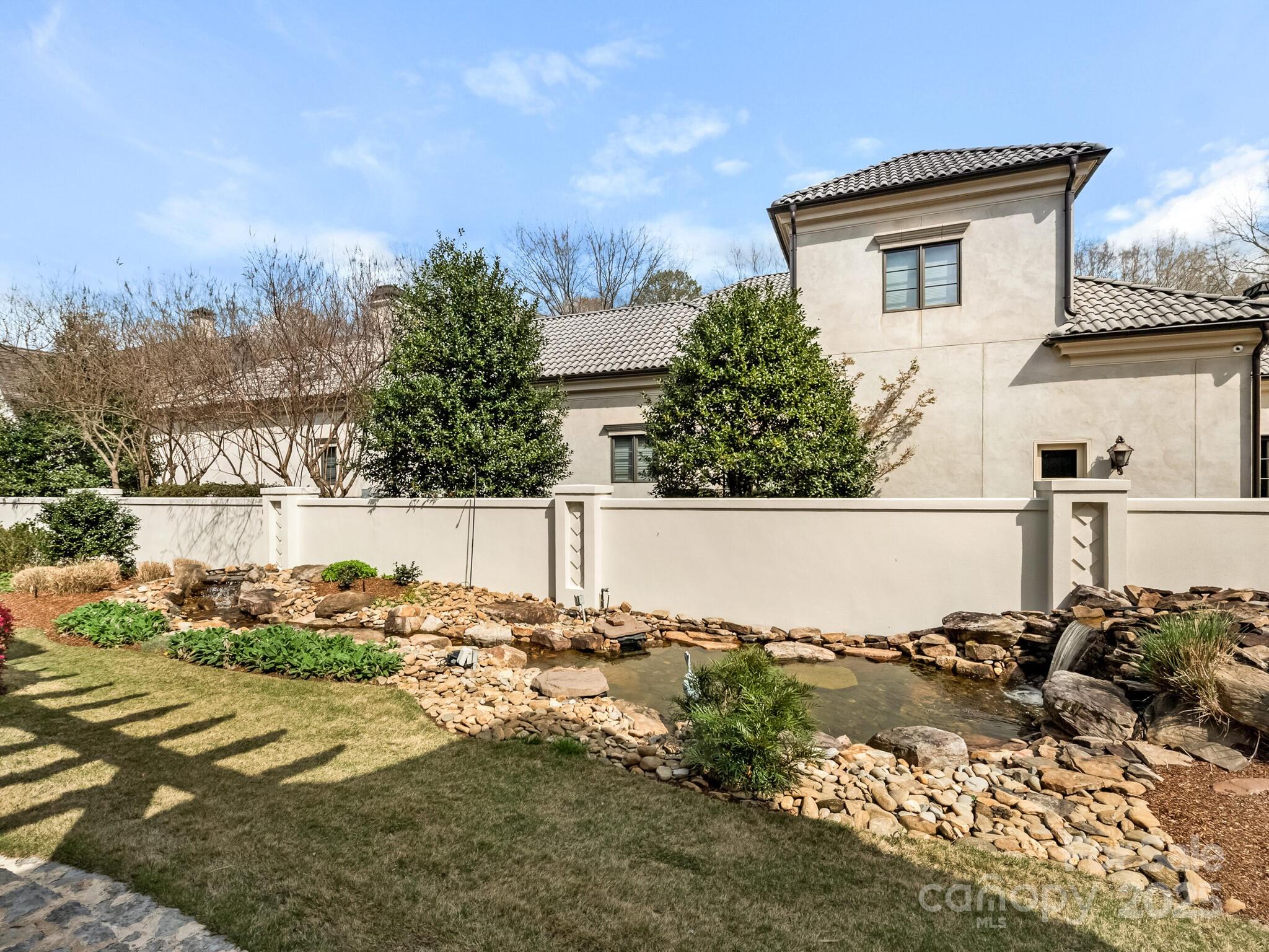 8525 Double Eagle Gate Way, Unit 2 Charlotte, NC 28210 - Photo 47 of 48 a view of front of house with a yard