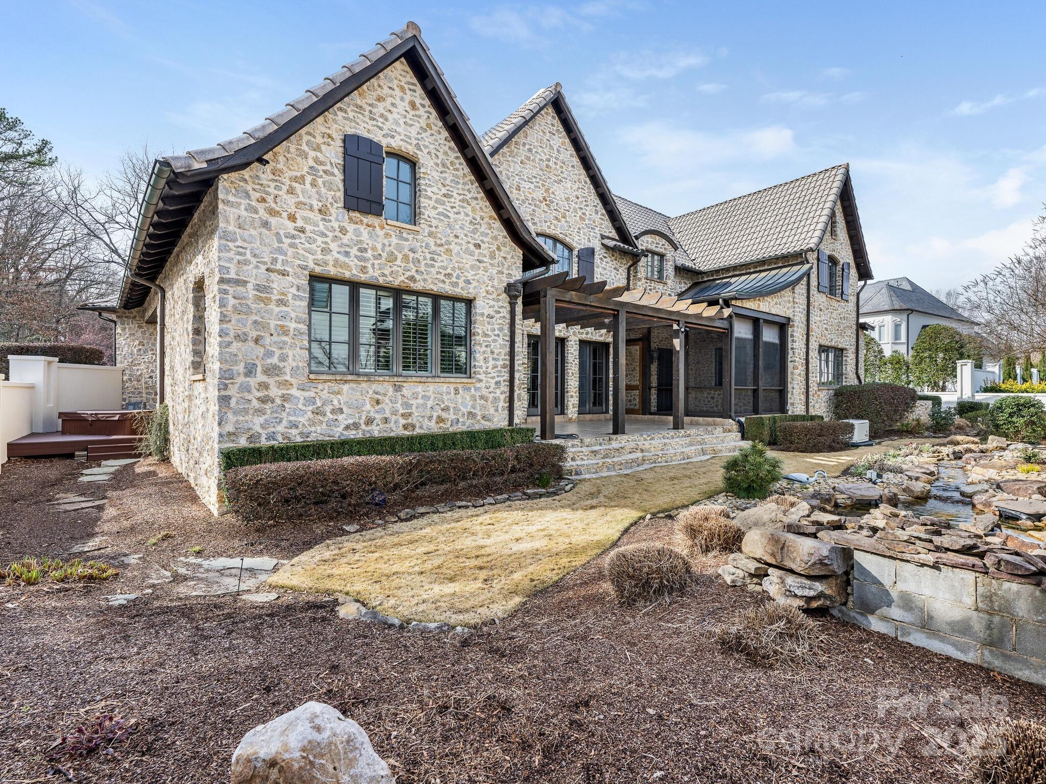8525 Double Eagle Gate Way, Unit 2 Charlotte, NC 28210 - Photo 48 of 48 a front view of a house with a yard