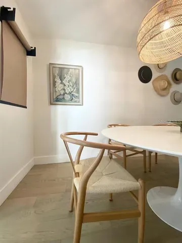 a view of a livingroom with furniture and a couch