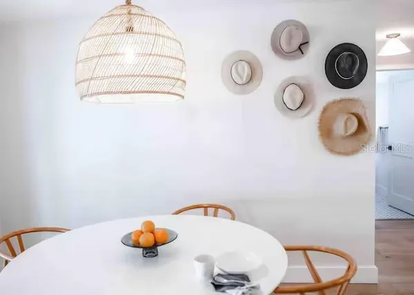 a kitchen with cabinets appliances and a sink