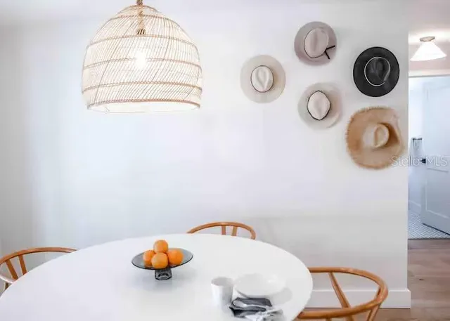 a kitchen with cabinets appliances and a sink
