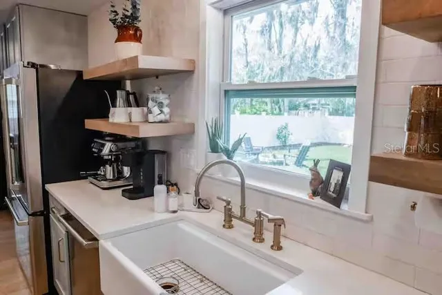 a swimming pool with chairs