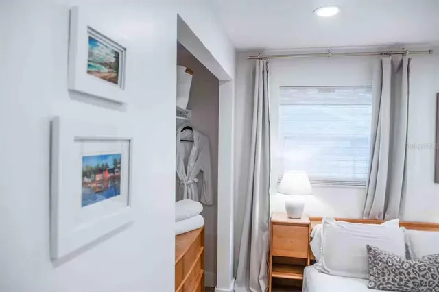 a dining room with a table and chairs