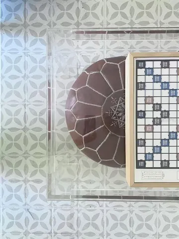 a view of a house with backyard sitting area and garden