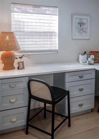 a view of a chairs and table in the patio