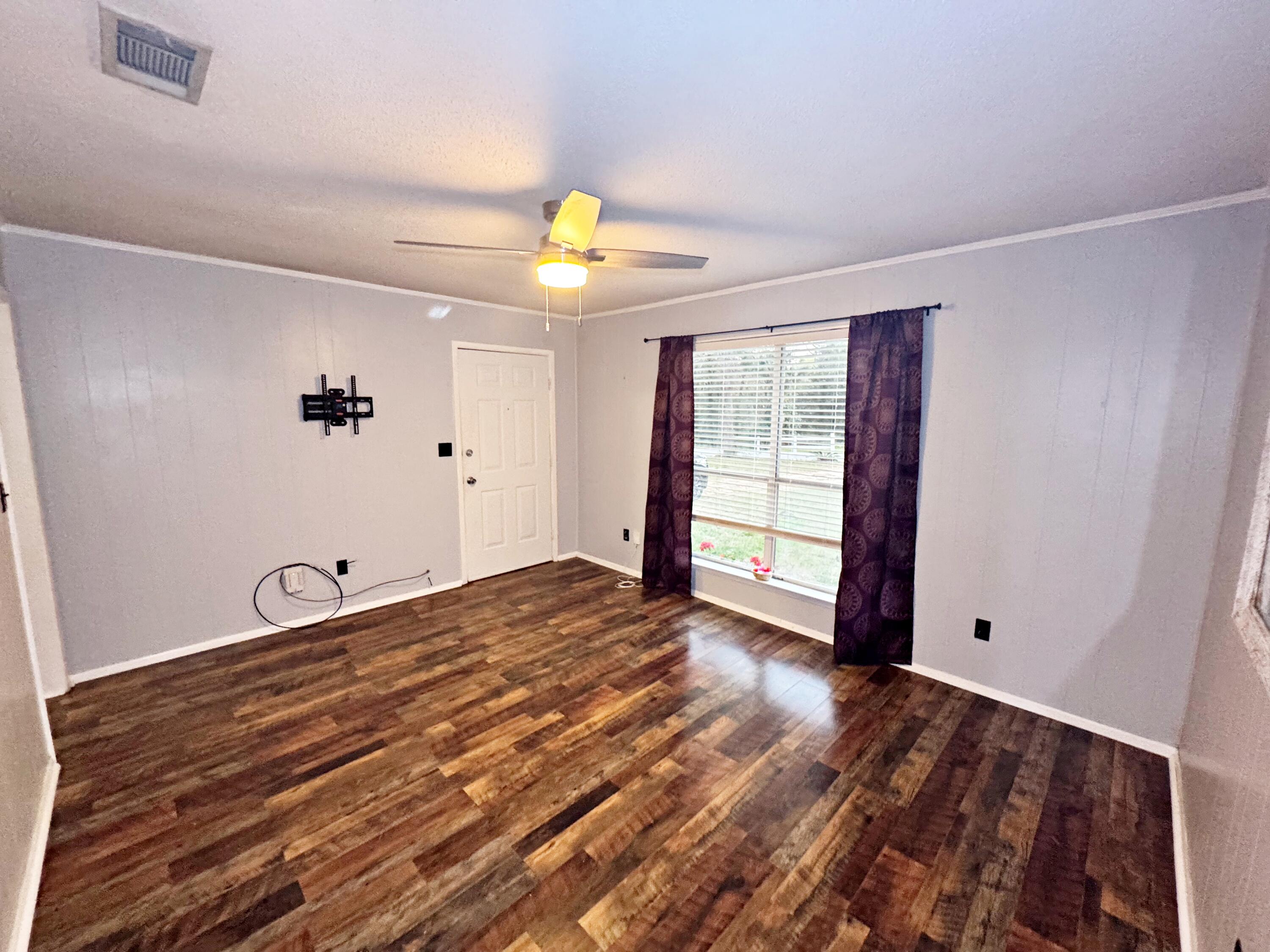 3183 Audrey Drive Crestview, FL 32539 - Photo 6 of 14 a view of an empty room with a window