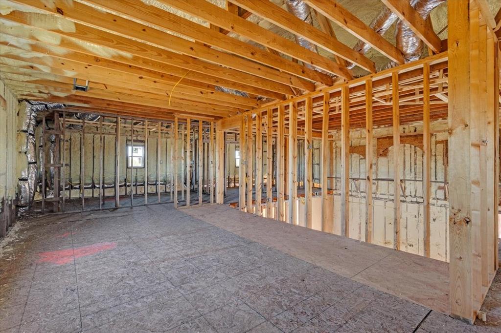 1265 Tbd County Road Bonham, TX 75418 - Photo 8 of 12 a view of an empty room with wooden walls