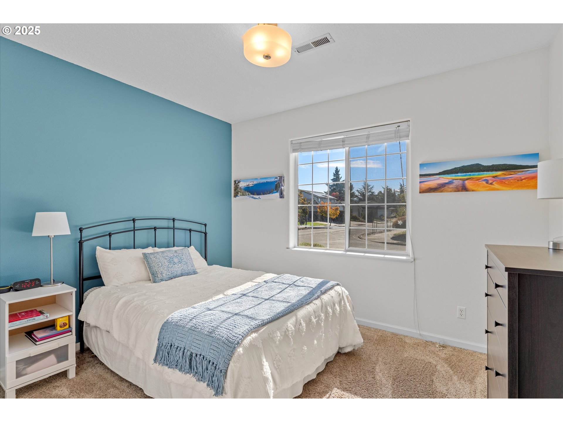 6475 Southeast 33rd Way Gresham, OR 97080 - Photo 24 of 47 a bedroom with a bed and a window