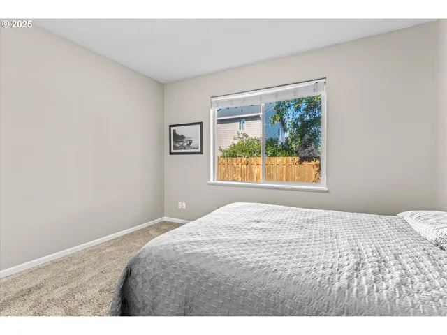 a view of a backyard with furniture