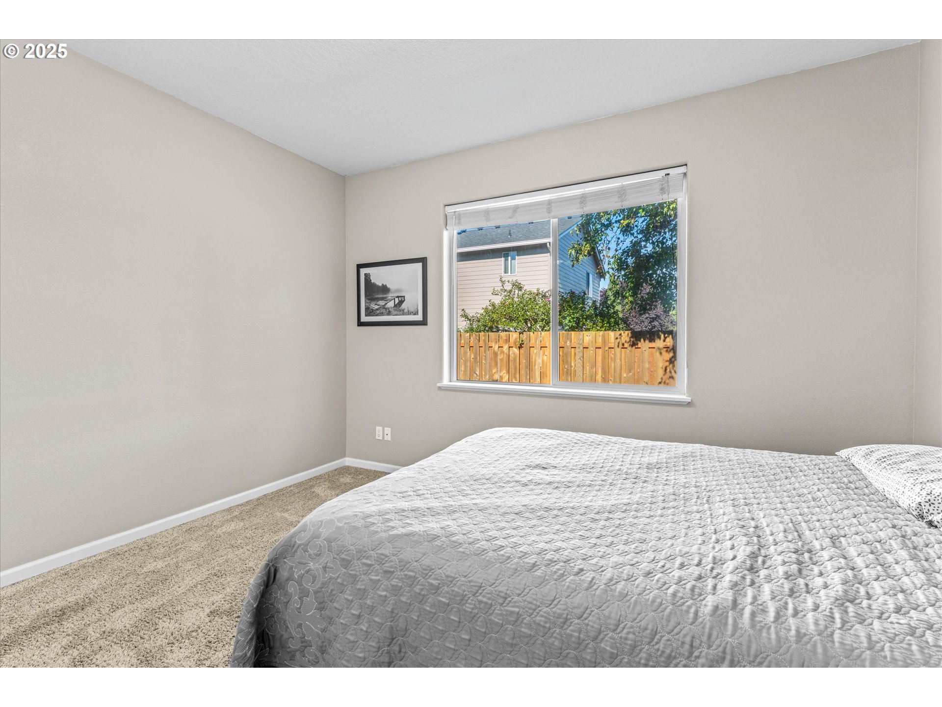 6475 Southeast 33rd Way Gresham, OR 97080 - Photo 35 of 47 a bedroom with a bed and a window