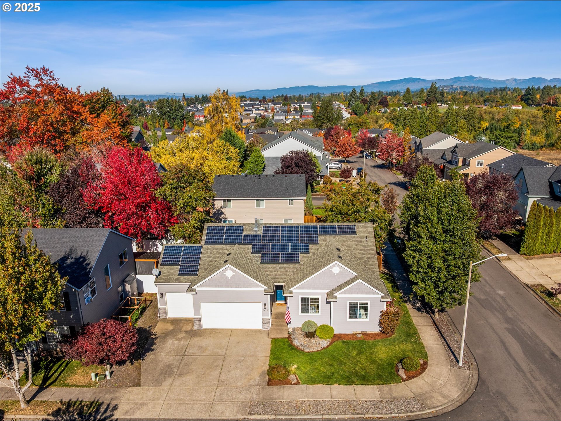 6475 Southeast 33rd Way Gresham, OR 97080 - Photo 4 of 47 a view of houses with an outdoor space and seating