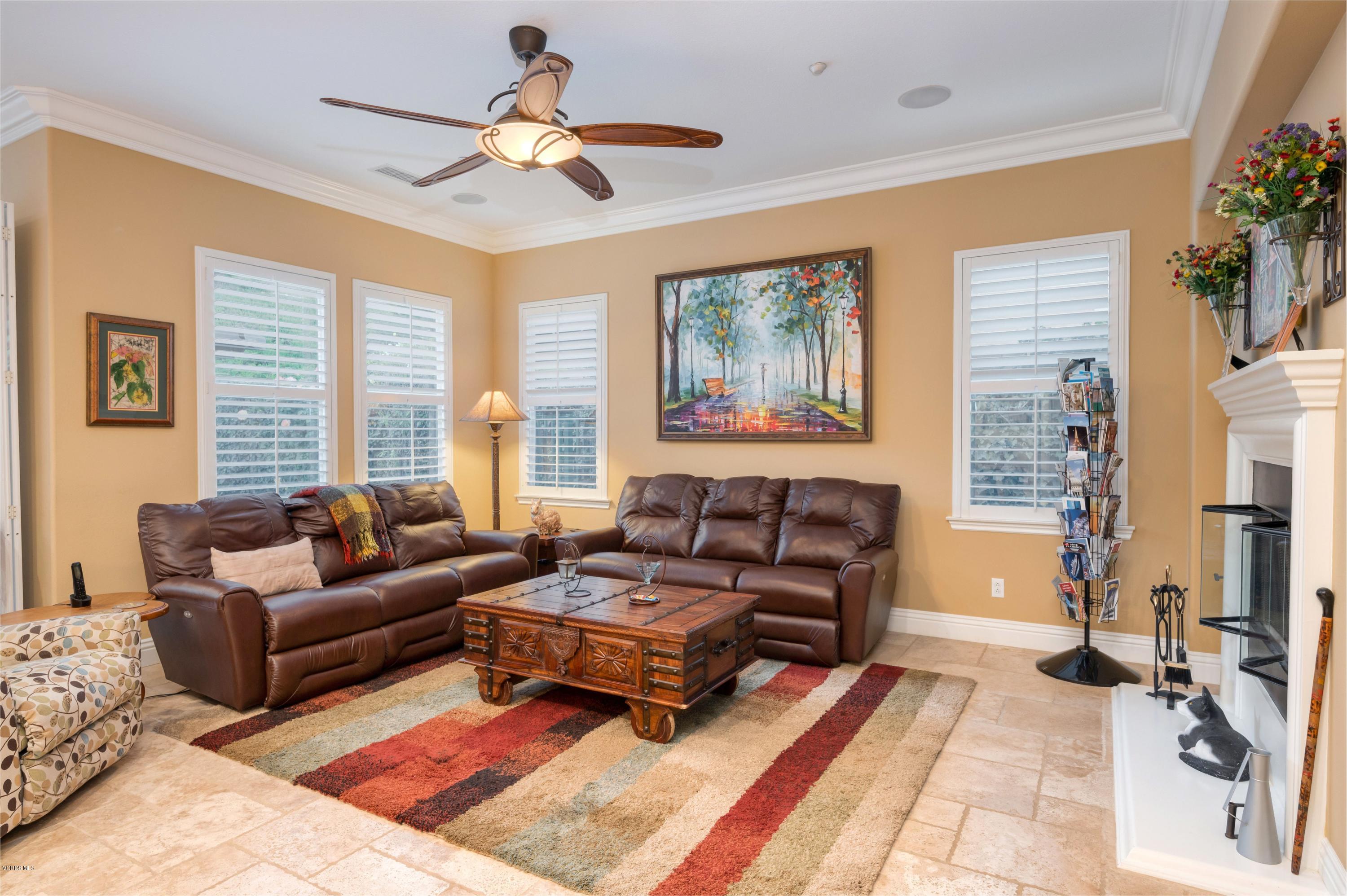 6945 Shadow Wood Drive Moorpark, CA 93021 - Photo 18 of 42 a living room with furniture and a large window