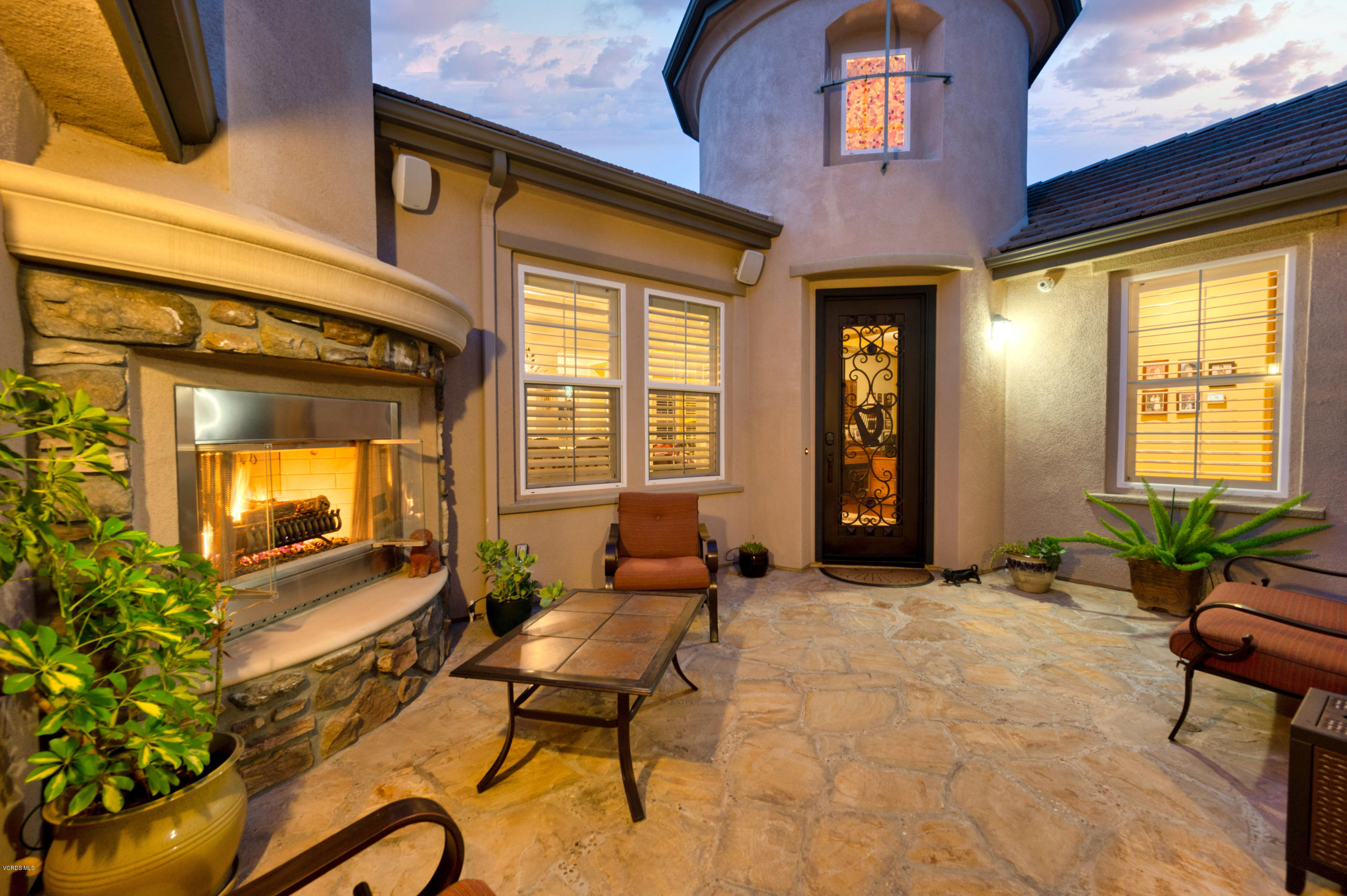 6945 Shadow Wood Drive Moorpark, CA 93021 - Photo 3 of 42 a building outdoor space with patio furniture