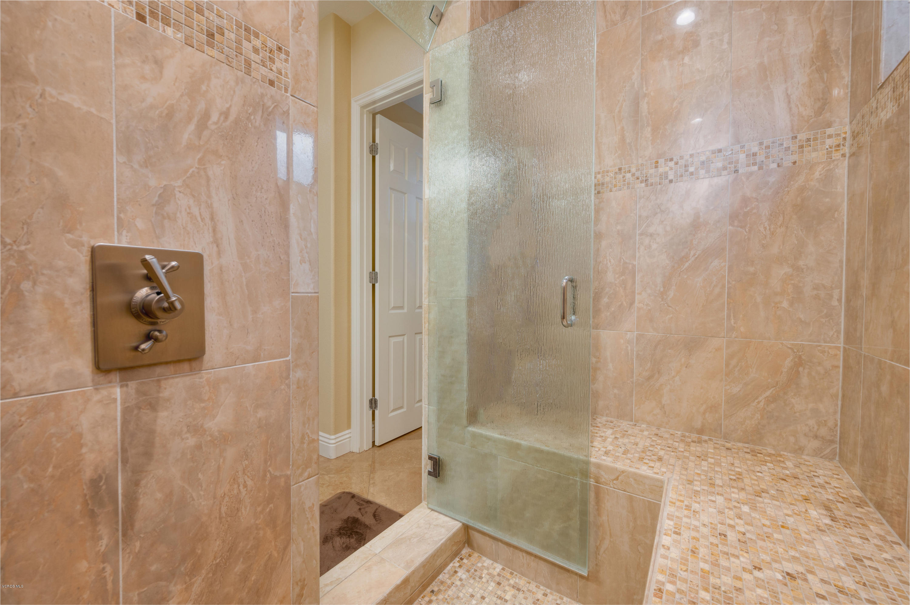 6945 Shadow Wood Drive Moorpark, CA 93021 - Photo 28 of 42 a bathroom with a shower