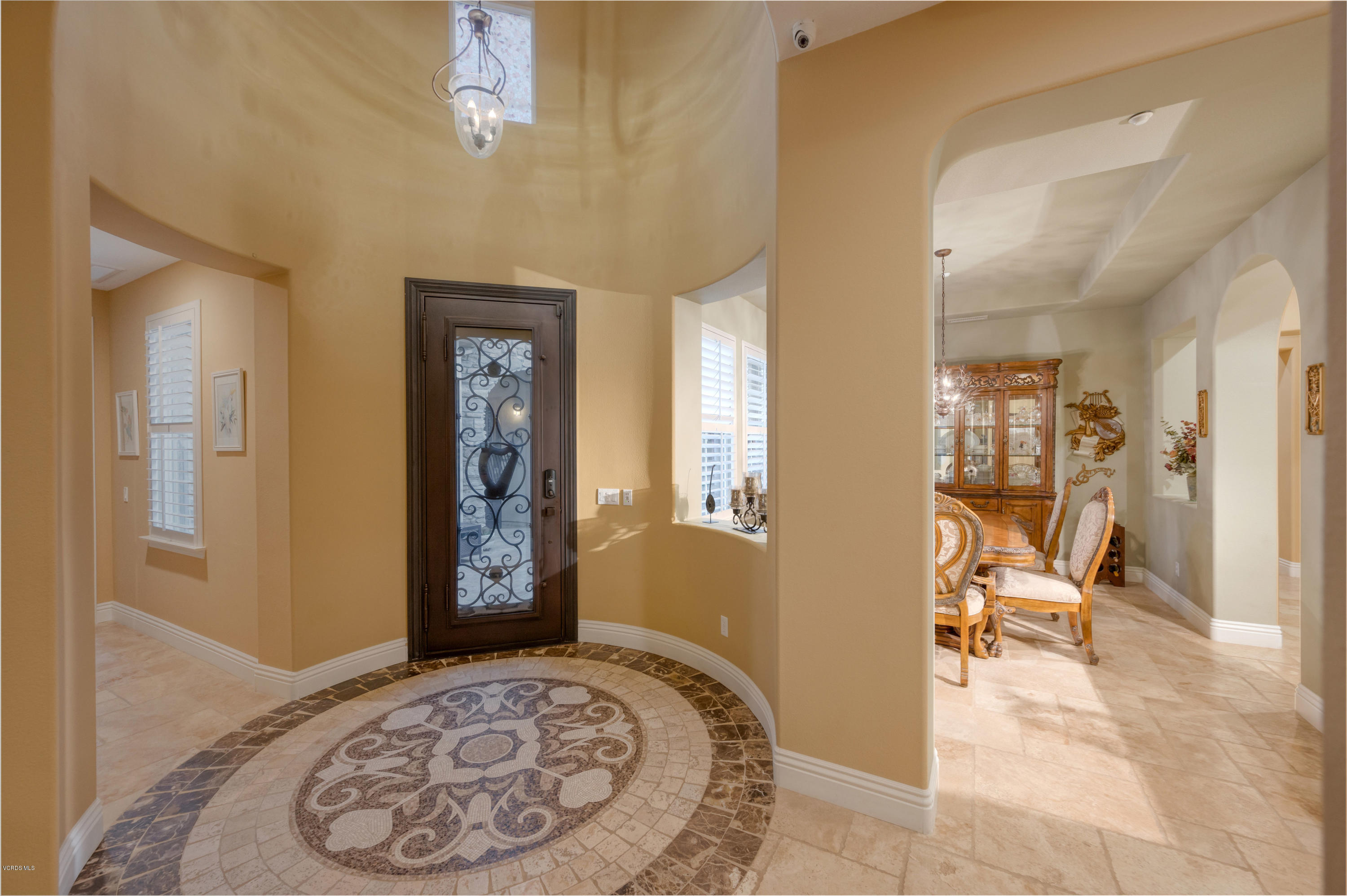 6945 Shadow Wood Drive Moorpark, CA 93021 - Photo 5 of 42 a view of a hallway with dining area and workspace