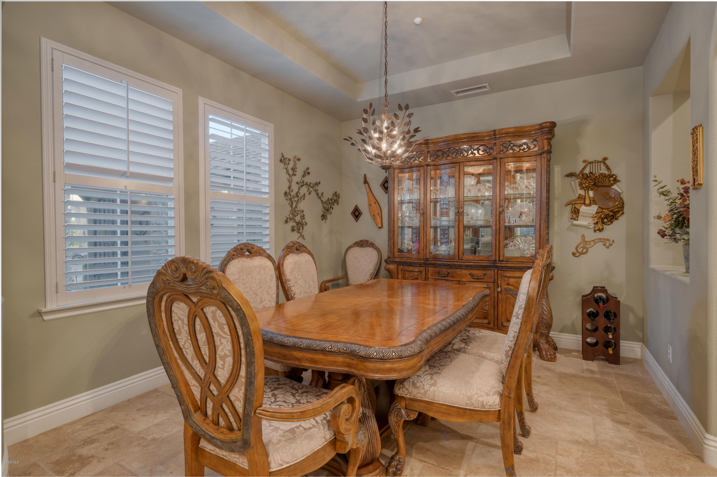 6945 Shadow Wood Drive Moorpark, CA 93021 - Photo 6 of 42 a dining room with furniture and chandelier kitchen