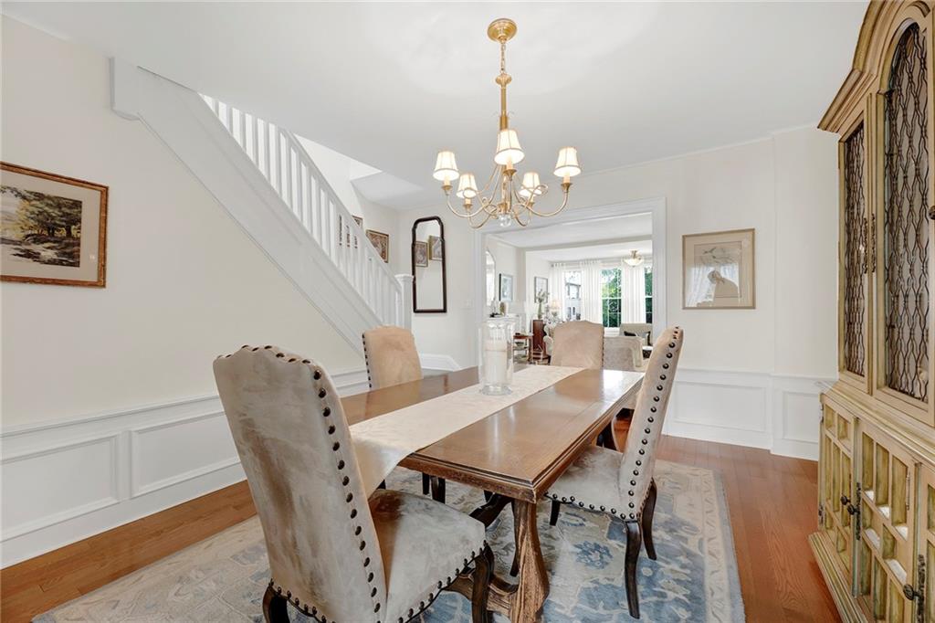 90 MacKay Place Brooklyn, NY 11209 - Photo 11 of 32 a view of a dining room with furniture and wooden floor