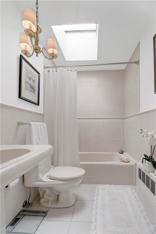 90 MacKay Place Brooklyn, NY 11209 - Photo 20 of 32 a bathroom with a sink a toilet and shower