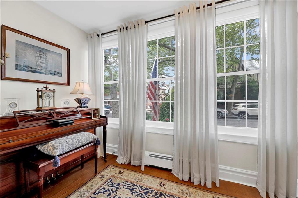 90 MacKay Place Brooklyn, NY 11209 - Photo 3 of 32 a bed room with a bed and a window