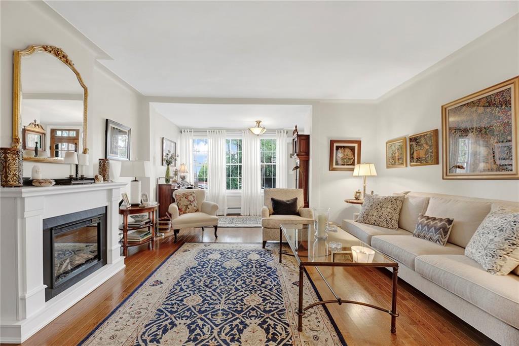 90 MacKay Place Brooklyn, NY 11209 - Photo 6 of 32 a living room with furniture and a fireplace