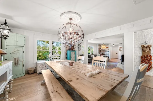 a white stove top oven sitting inside of a kitchen