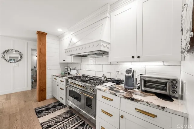 a spacious bedroom with a bed and a couch