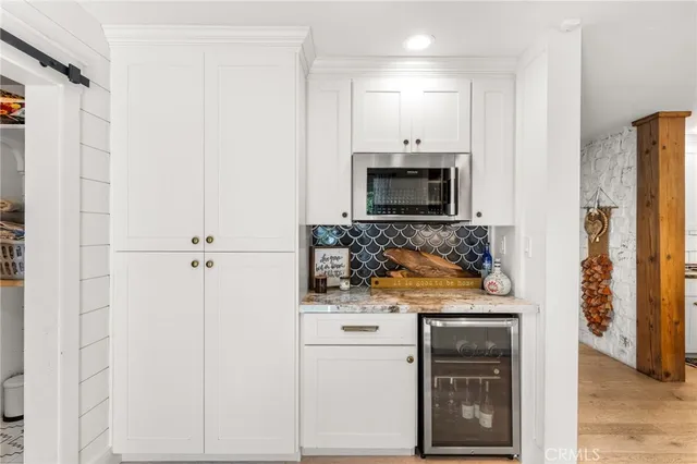 a bathroom with a shower and a sink
