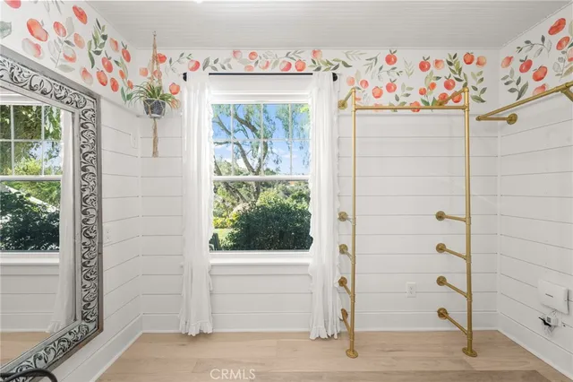 a view of a patio with a table and chairs