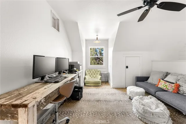 a view of a road with a building in the background