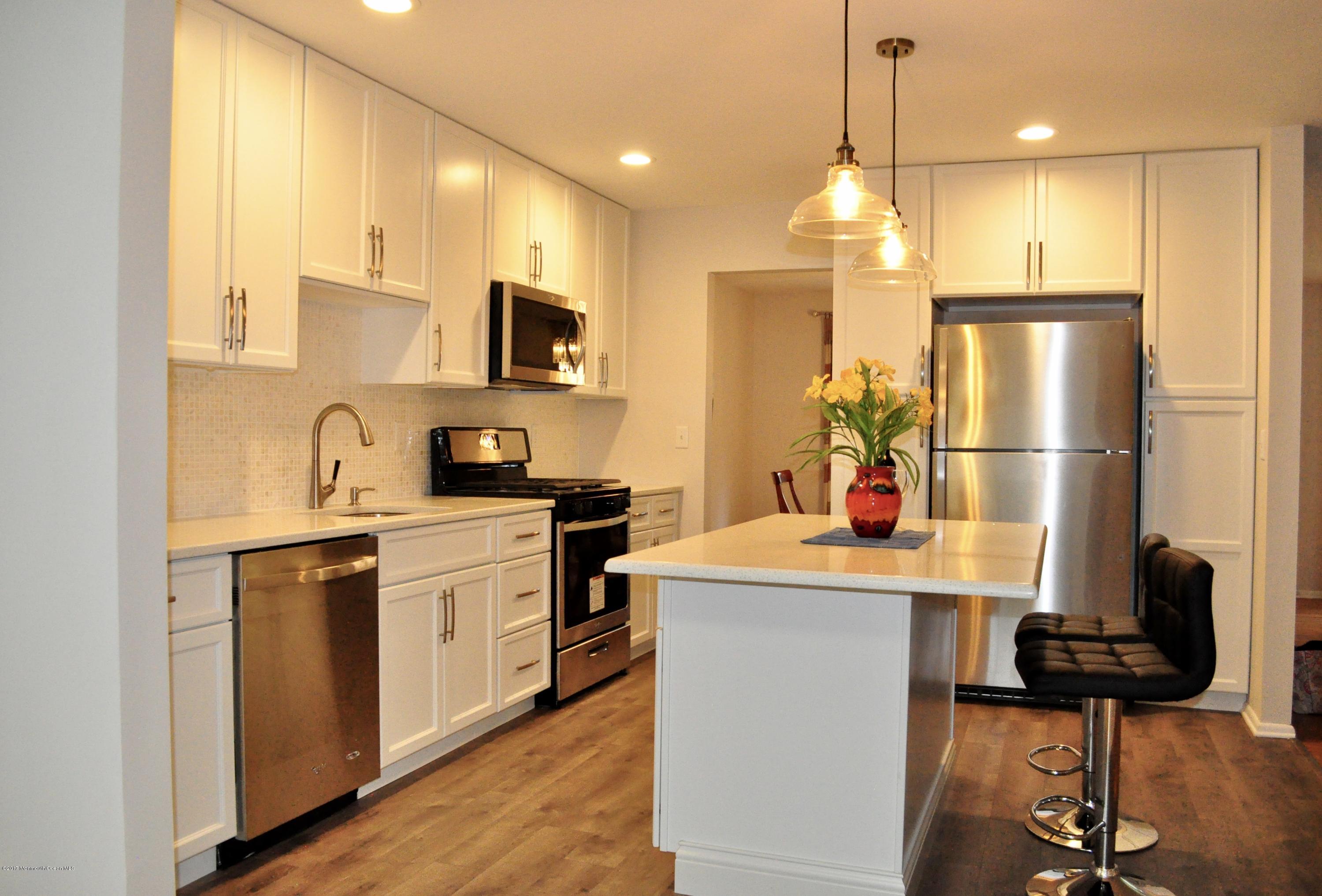 112 Jumping Brook Road Lincroft, NJ 07738 - Photo 5 of 10 fullsizeoutput_1c7d