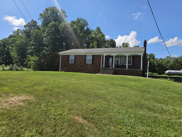 a house view with a garden space