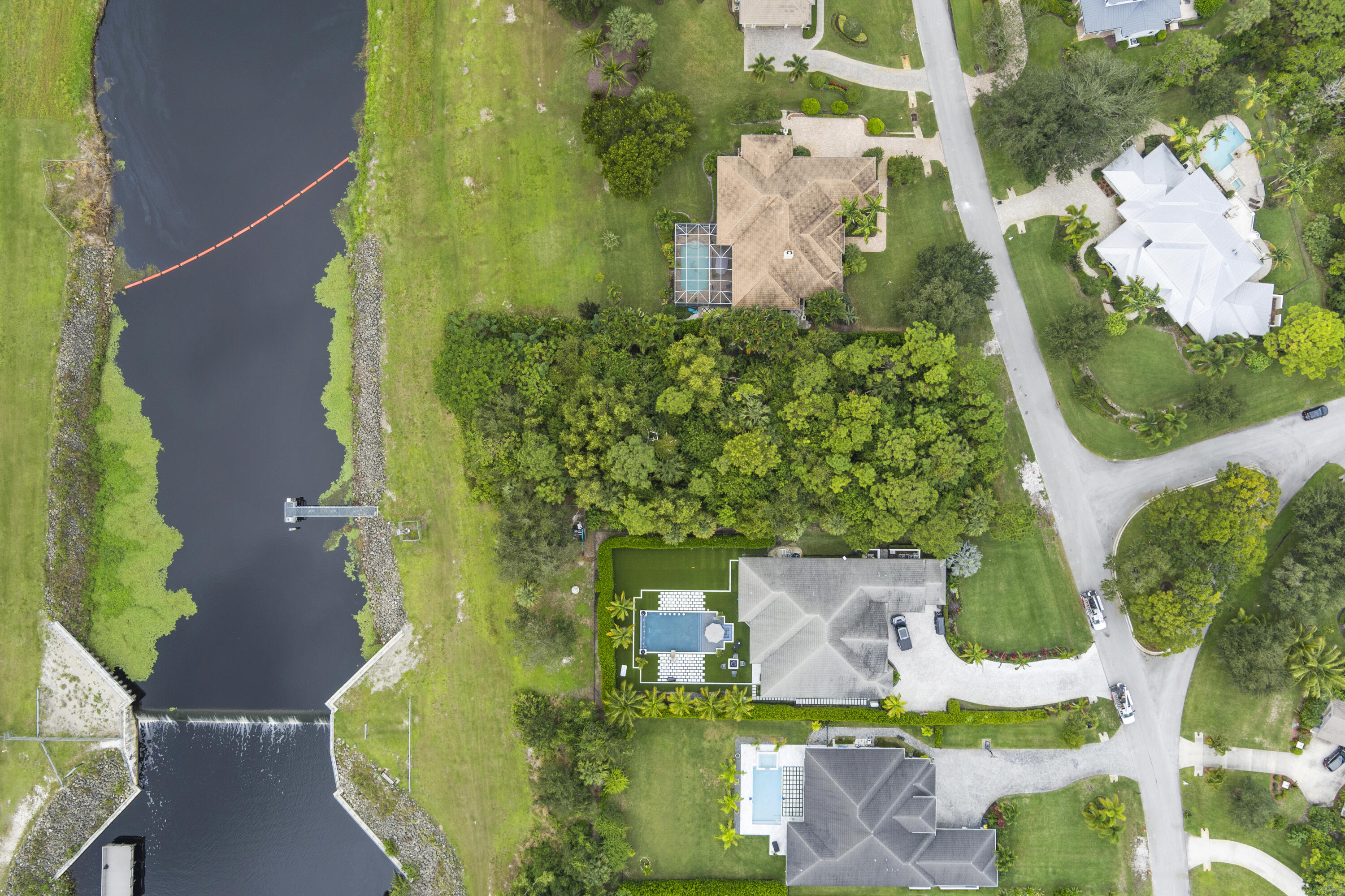 3544 Southwest Rivers End Way Palm City, FL 34990 - Photo 12 of 17 an aerial view of a house with a garden