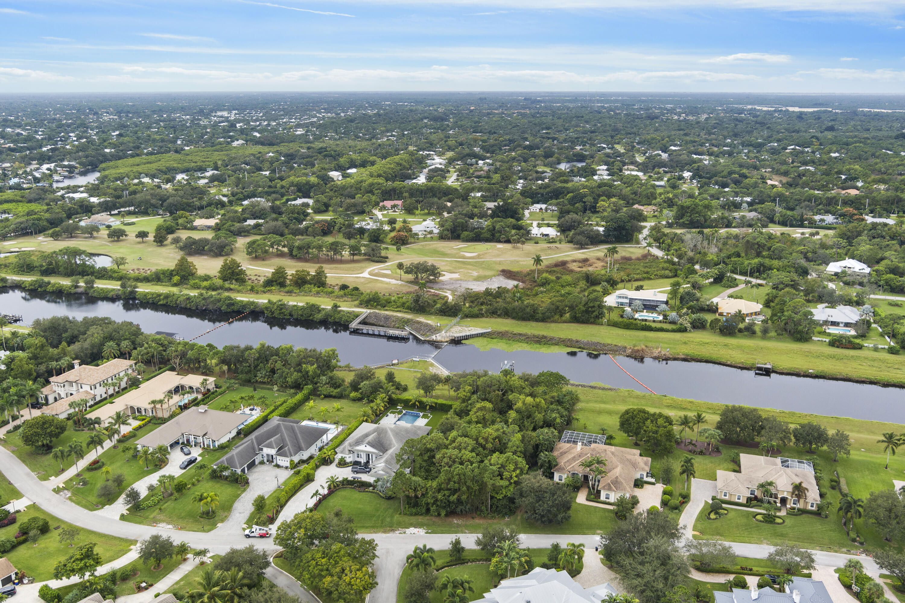 3544 Southwest Rivers End Way Palm City, FL 34990 - Photo 15 of 17 an aerial view of city and lake view