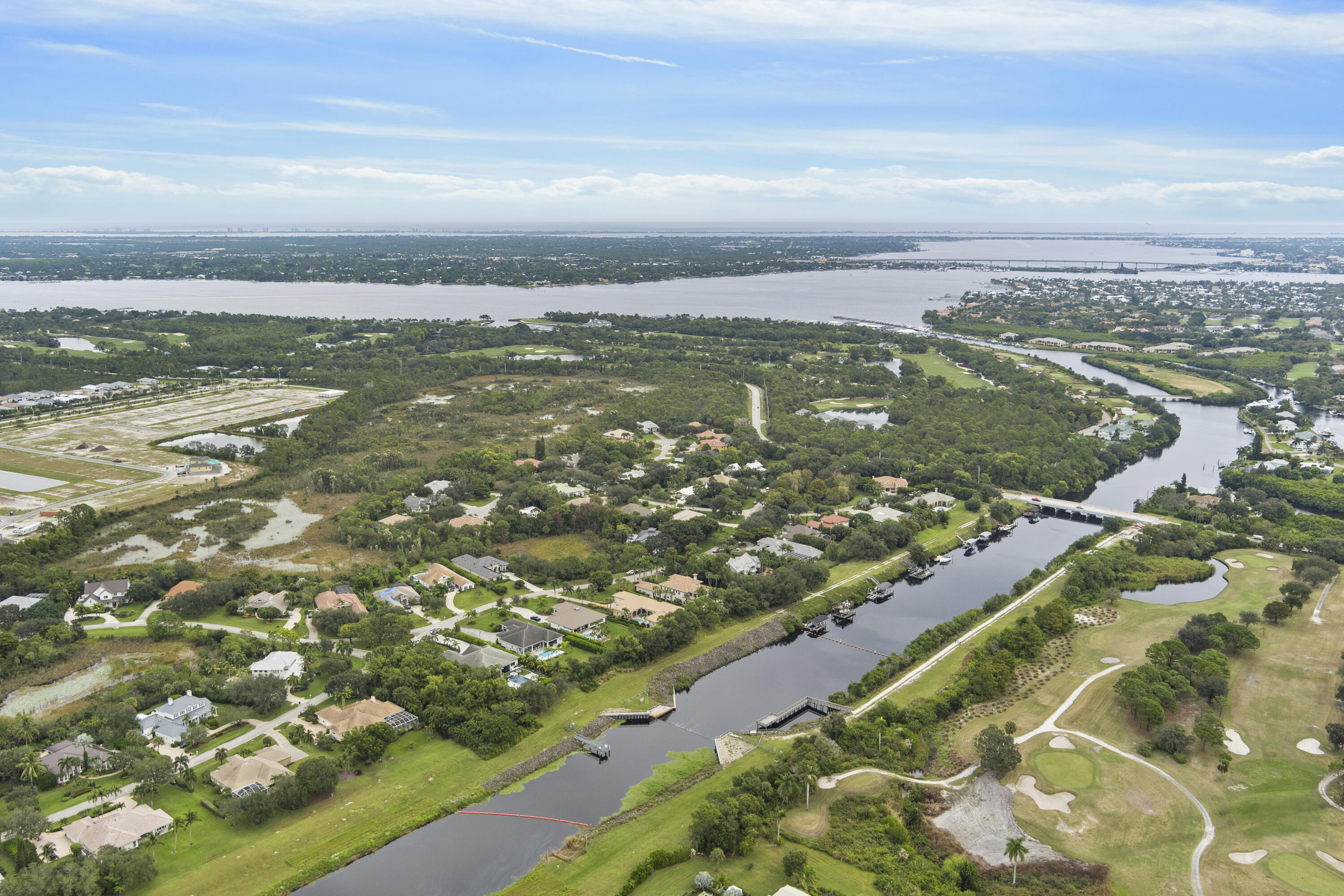 3544 Southwest Rivers End Way Palm City, FL 34990 - Photo 7 of 17 a view of a city with an ocean