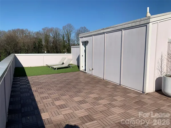 a view of backyard with cabin