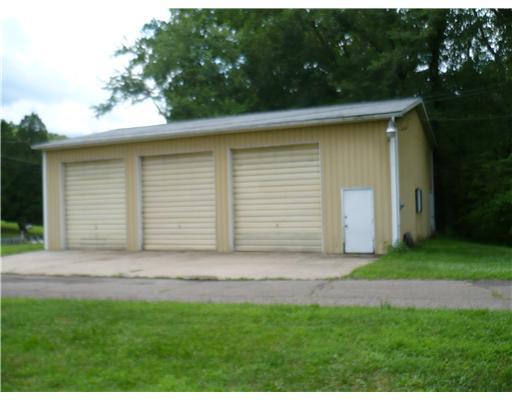 2163 Bennett's Run Road Beaver Falls, PA 15010 - Photo 4 of 12 Shop/Service Bay(s). 32x48 shop with 3 bays, 12 ft. doors, separate electric
