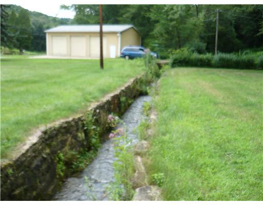 2163 Bennett's Run Road Beaver Falls, PA 15010 - Photo 6 of 12 Land/Lot. small stream on property
