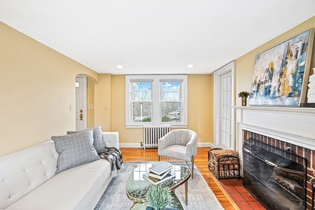 14 Fife Road Wellesley, MA 02481 - Photo 13 of 36 a living room with furniture and a fireplace