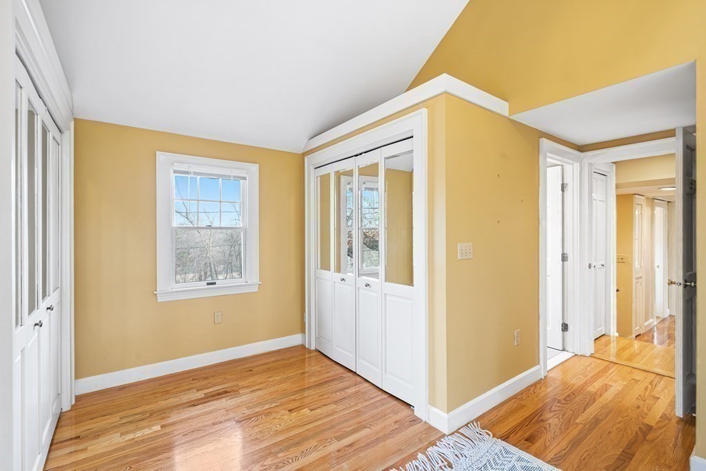 14 Fife Road Wellesley, MA 02481 - Photo 20 of 36 a view of a bedroom with wooden floor and a bedroom