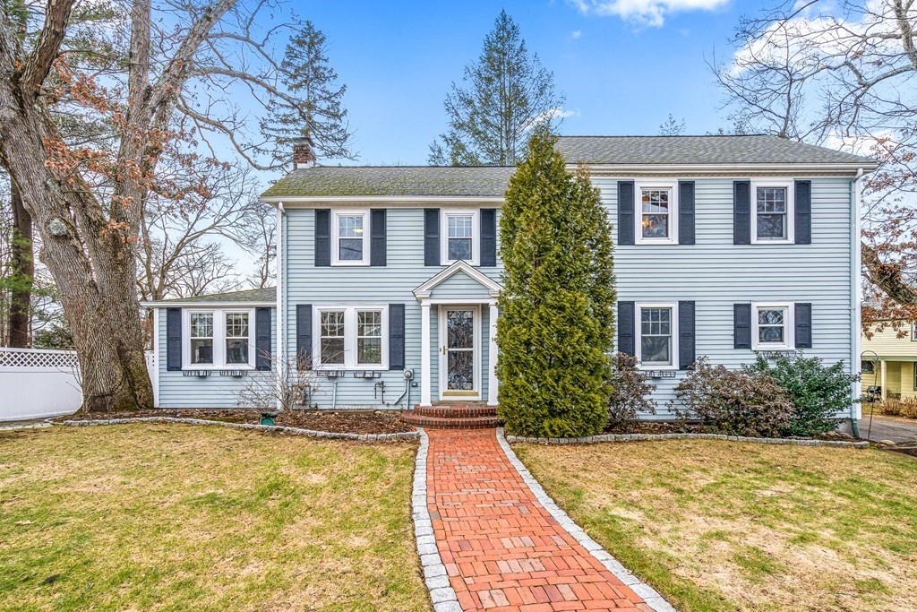 14 Fife Road Wellesley, MA 02481 - Photo 2 of 36 a front view of house with yard and trees around