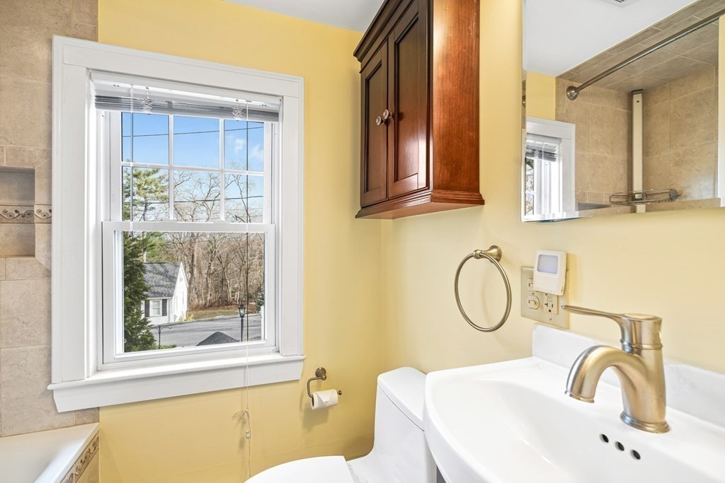 14 Fife Road Wellesley, MA 02481 - Photo 22 of 36 a bathroom with a sink vanity mirror and a toilet