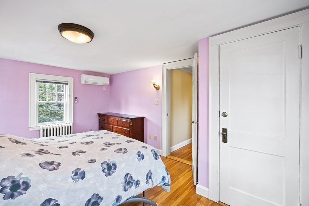 14 Fife Road Wellesley, MA 02481 - Photo 26 of 36 a bedroom with a bed and a lamp