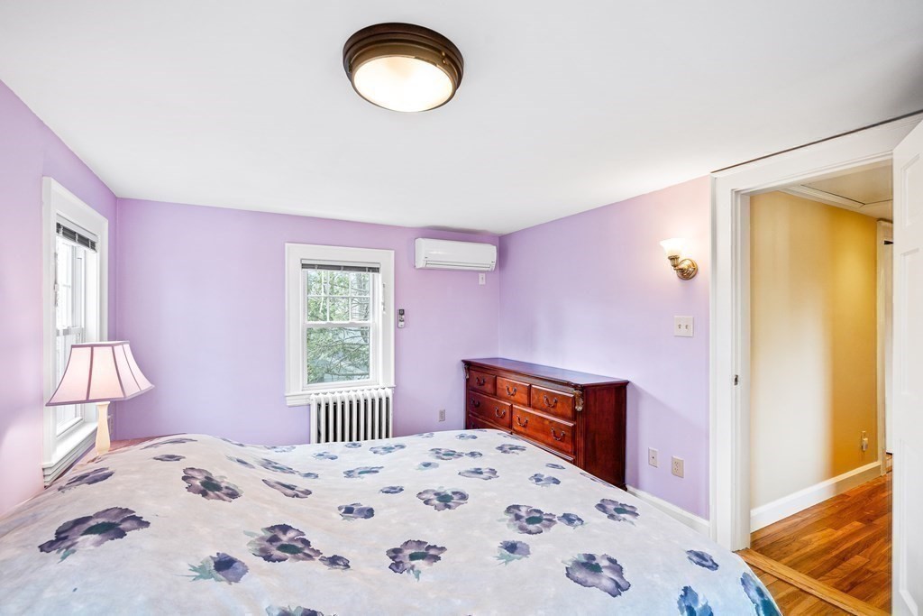 14 Fife Road Wellesley, MA 02481 - Photo 27 of 36 a bedroom with a bed and a dresser next to a window