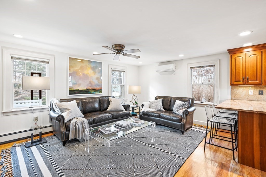 14 Fife Road Wellesley, MA 02481 - Photo 3 of 36 a living room with furniture and a flat screen tv